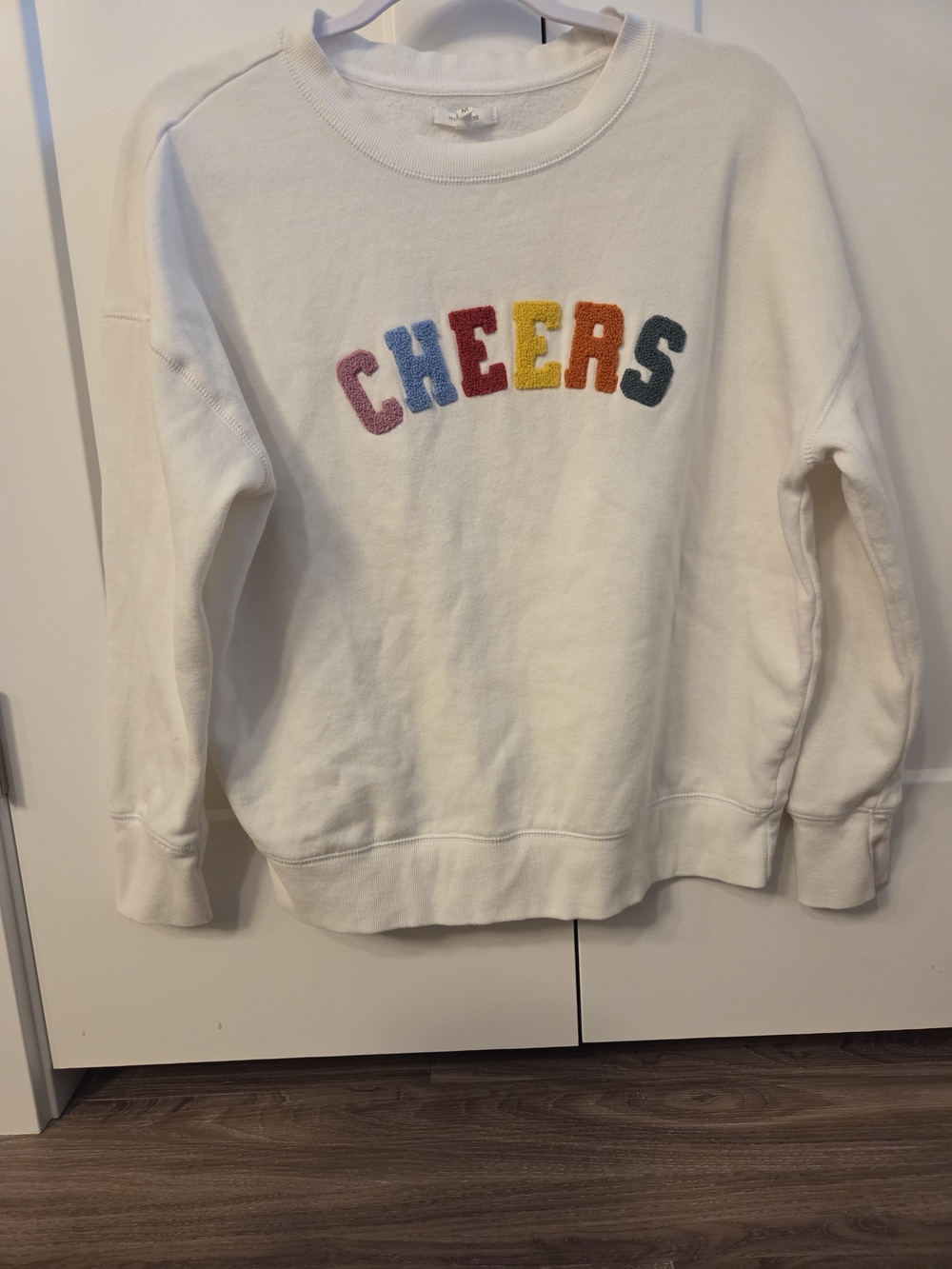 Maurices White Crewneck Sweater with Multicolor 'CHEERS' Chenille Letters